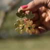 Gold Six Petalled Flower Dangle Earrings