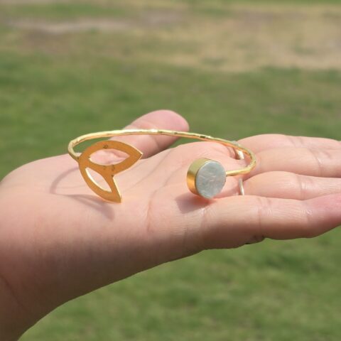 Open-cuff bracelet with openwork leaf design